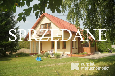 Uroczy, nieduży dom z atrakcyjną działką