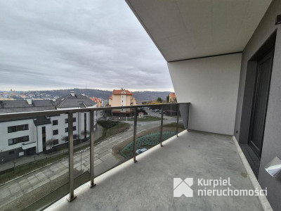 Mieszkanie w nowym bloku z garażem i komórką