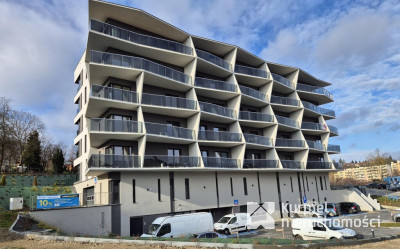 Mieszkanie w nowym bloku z garażem i komórką