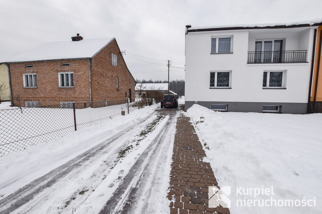 Przestronny dom typu kostka z garażem i tarasem