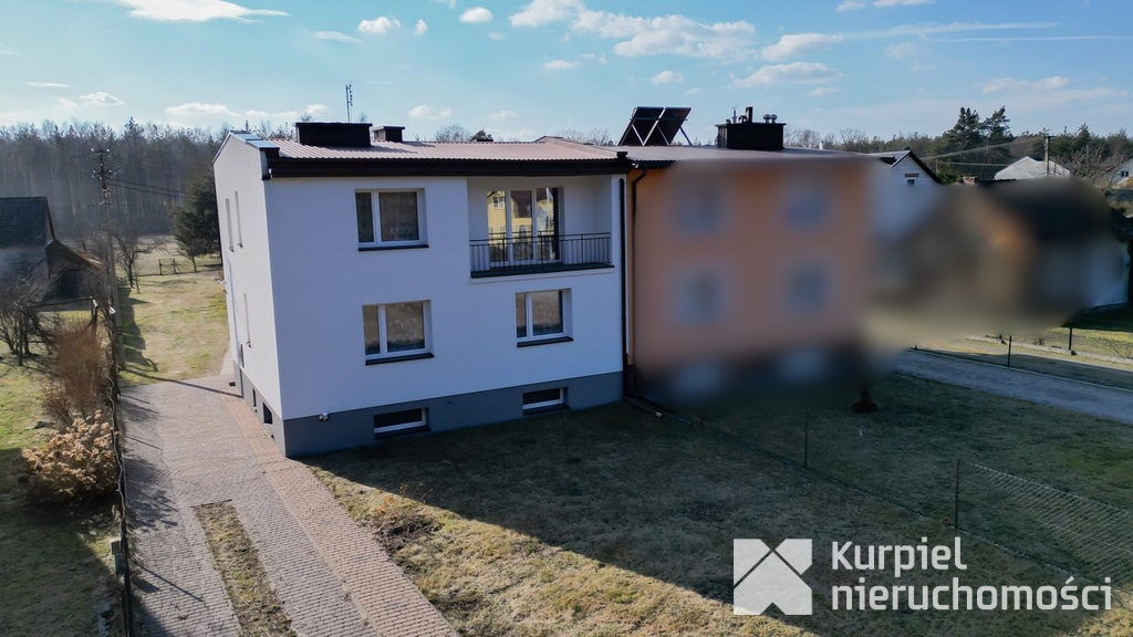 Przestronny dom typu kostka z garażem i tarasem