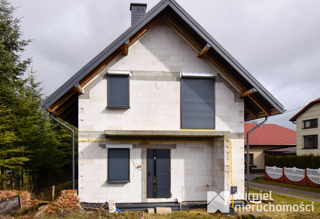 Funkcjonalny dom na dużej działce / cisza i zieleń