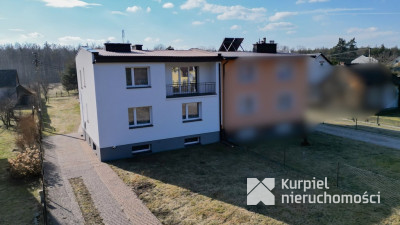 Przestronny dom typu kostka z garażem i tarasem