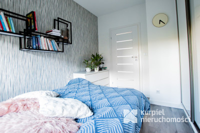 Funkcjonalne mieszkanie z dużym balkonem za parkie