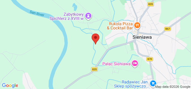 Dom z pełnego bala z zarybionym stawem